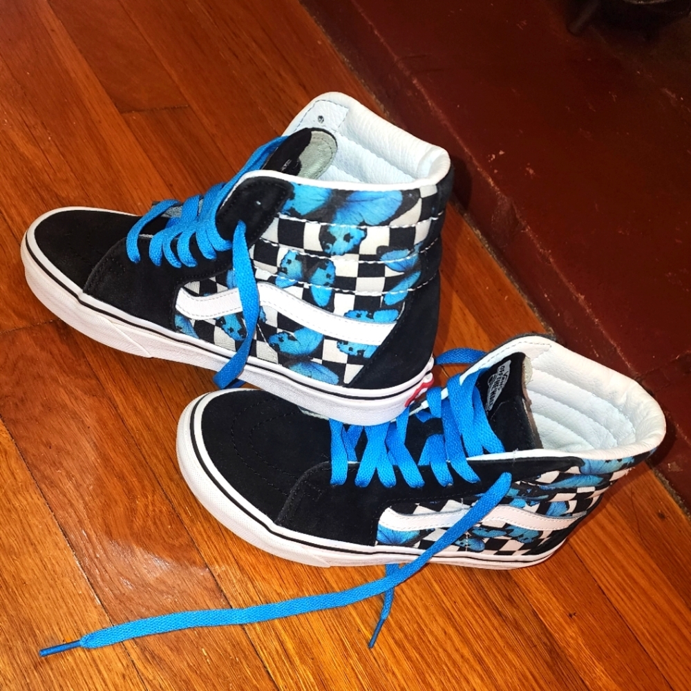 High top black & white checkered vans with blue butterfly accents sz. 5.5